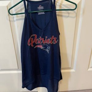 Woman’s off the shoulder Patriots shirt